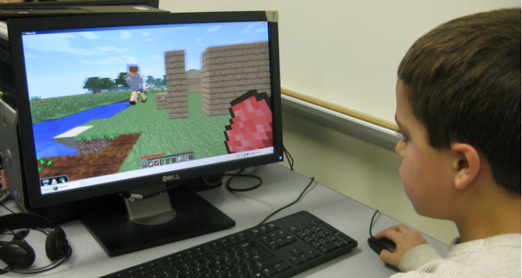 boy playing minecraft