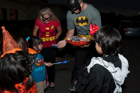 trick-or-treaters getting candy