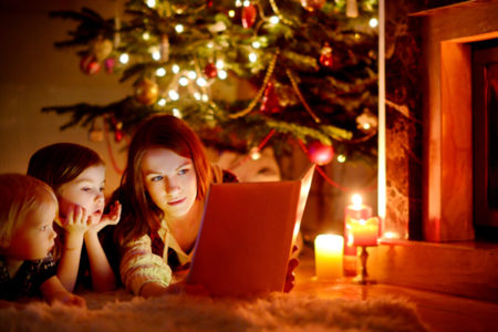 family ready by christmas tree
