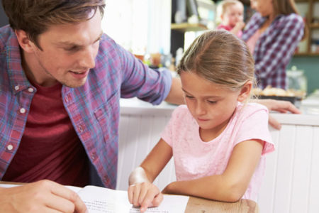 Father and daughter reading