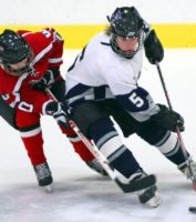 Jessie playing hockey