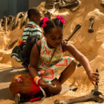 girl digging bones
