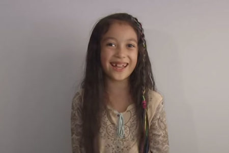 Iris, a second grade child artist, placed in K12's 9th Annual Art Competition. Her story is inspirational for artists and students.