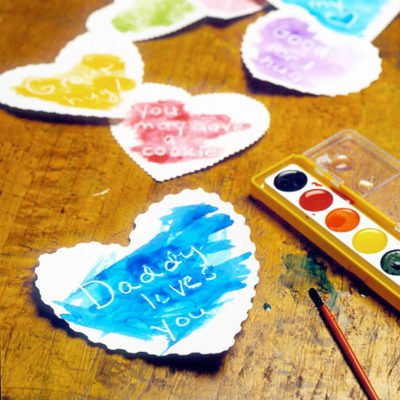 heart shaped cards with message under paint