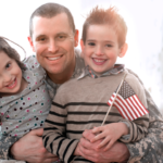 military family hugging