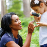 mom and daughter in the forest