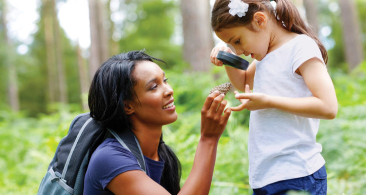 mom and daughter in the forest