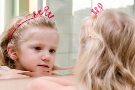 Girl Looking in Mirror