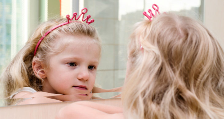 Girl Looking in Mirror