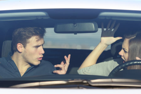 Couple arguing in car