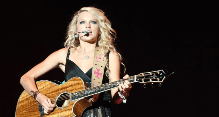 American country musician Taylor Swift performing live.