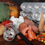 Cornucopia basket of foods and kitchen tools