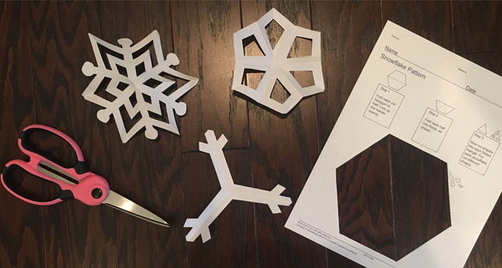 paper snowflakes with scissors