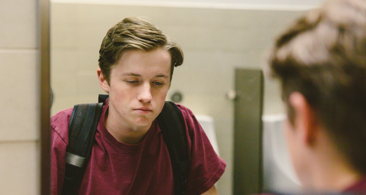 young boy looking sad