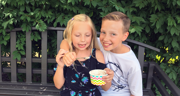 brother and sister eating ice cream