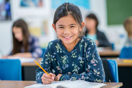 happy child in classroom