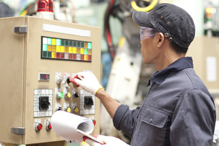 technician working at a machine