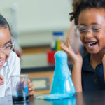 girls doing a science experiment