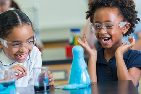 girls doing a science experiment