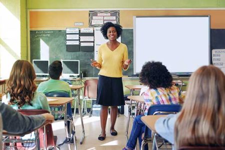 teacher speaking to middle school classroom