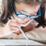 little girl using math app