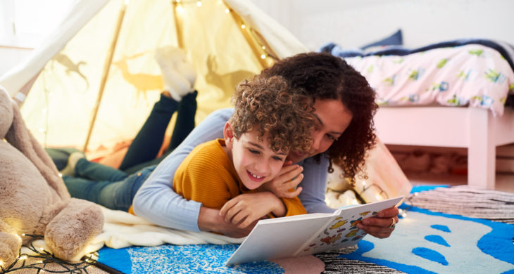 Mother reading to Child